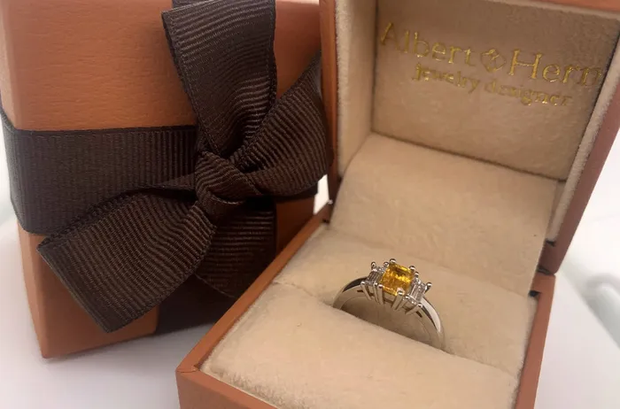 Albert Hern Rings Ring Three Stones Platinum One Yellow Sapphire and Two Diamonds