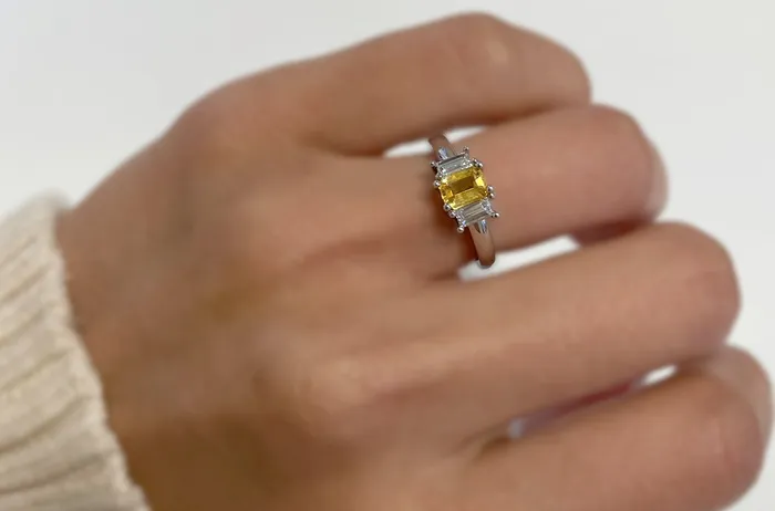 Albert Hern Rings Ring Three Stones Platinum One Yellow Sapphire and Two Diamonds